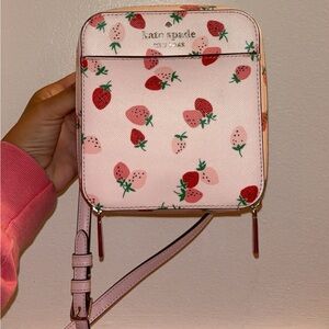 Adorable strawberry Kate spade mini you can’t go without